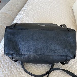 Jessica Simpson purse with shoulder strap.